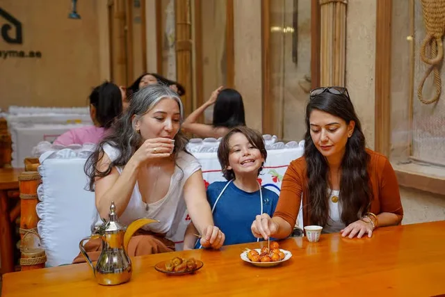 Old Dubai Premium Food Tour: Al Khayma, Souks & Abra Ride in Dubai — experience image 17 of 25
