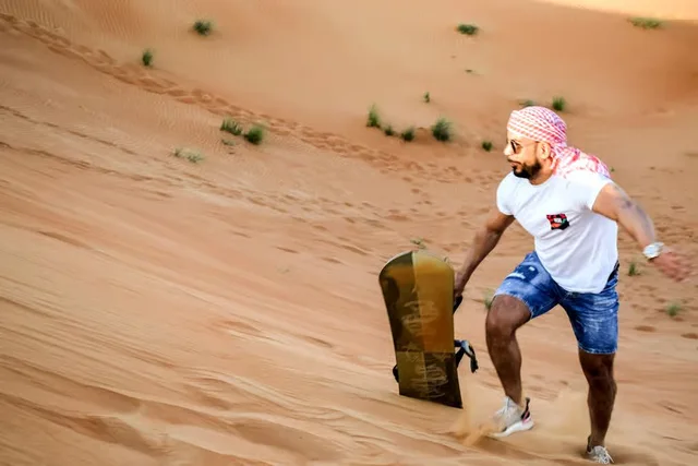 Dubai Red Dunes Desert Safari: Camel Ride & Sandboarding in Sharjah — experience image 20 of 24