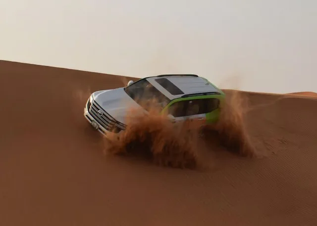 Dubai Red Dunes Desert Safari: Camel Ride & Sandboarding in Sharjah — experience image 17 of 24
