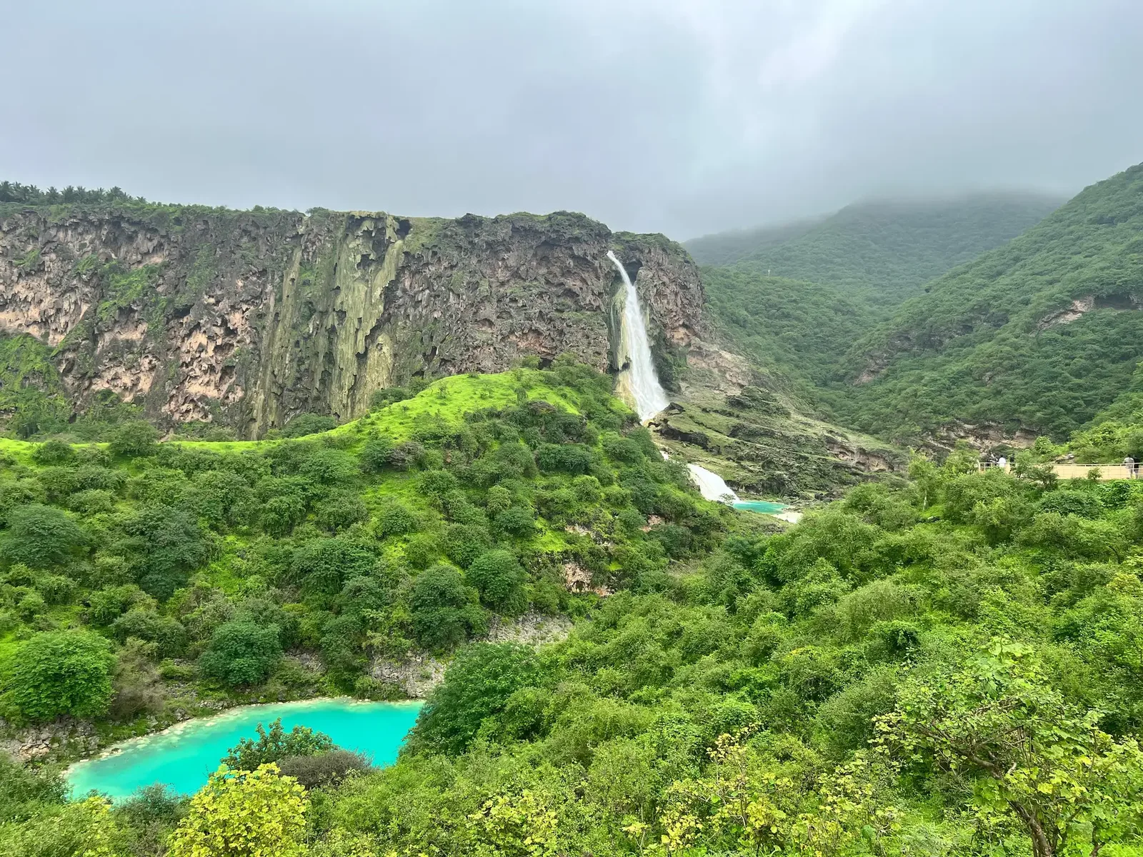 Seasonal green scenery and waterfalls at Wadi Darbat