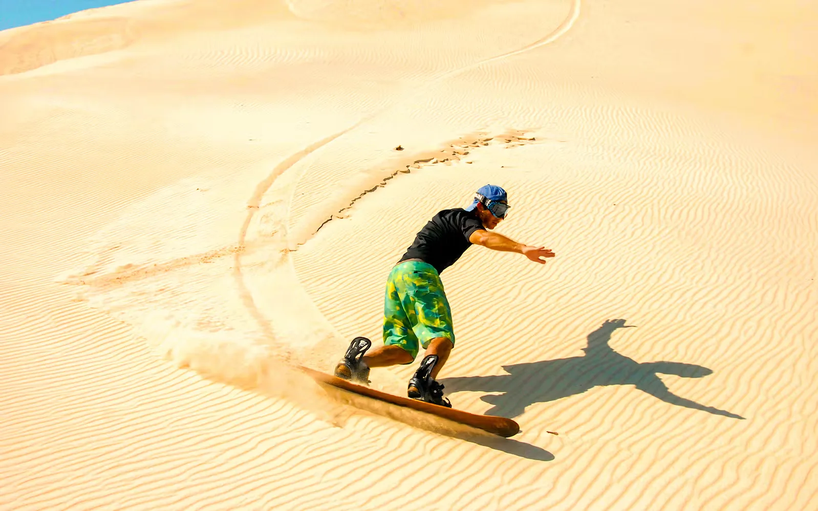Morning Desert Safari Ras Al Khaimah with Camel & Sandboarding experience in Ras Al-Khaimah