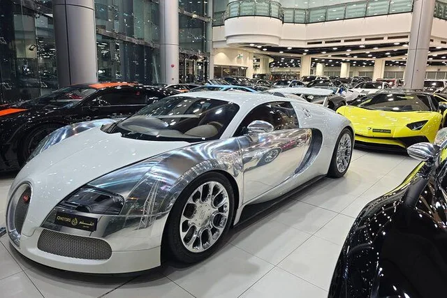 Dubai Luxury Car Showroom Tour with Dubai Mall Drop-Off experience in Dubai
